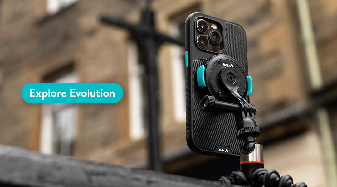 Mous Evolution iPhone case on universal accessory adaptor in a city