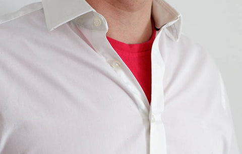 picture of bright pink shirt showing under a white shirt
