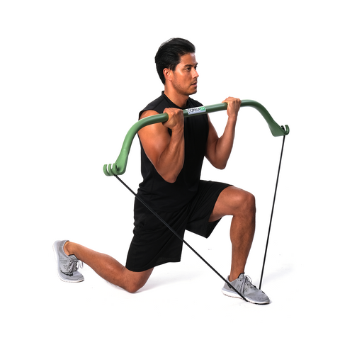 a man pairs lunges with resistance band training