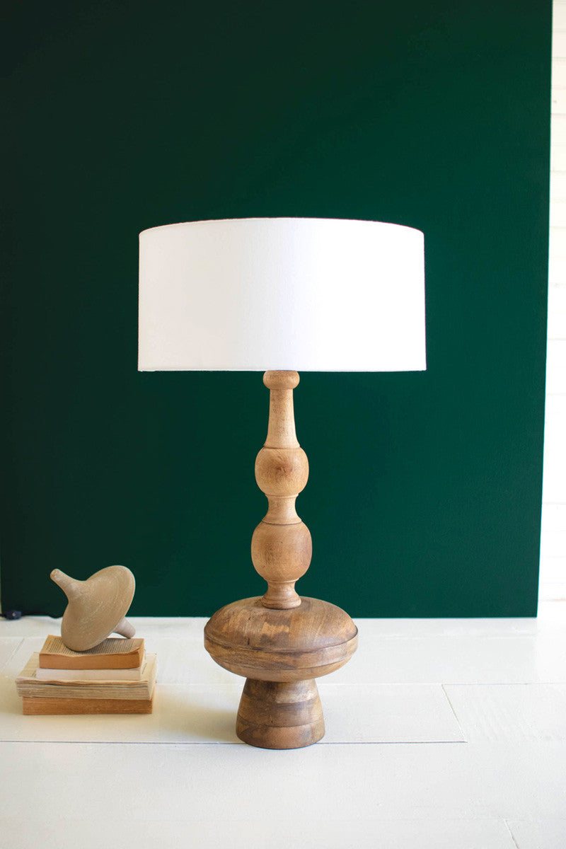  Carved Wooden Table Lamp With Of White Barrel Shade By Kalalou 