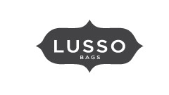 Lusso Bags talks about fair trade soy blend candles ethically handmade by women artisan refugees at Prosperity Candle