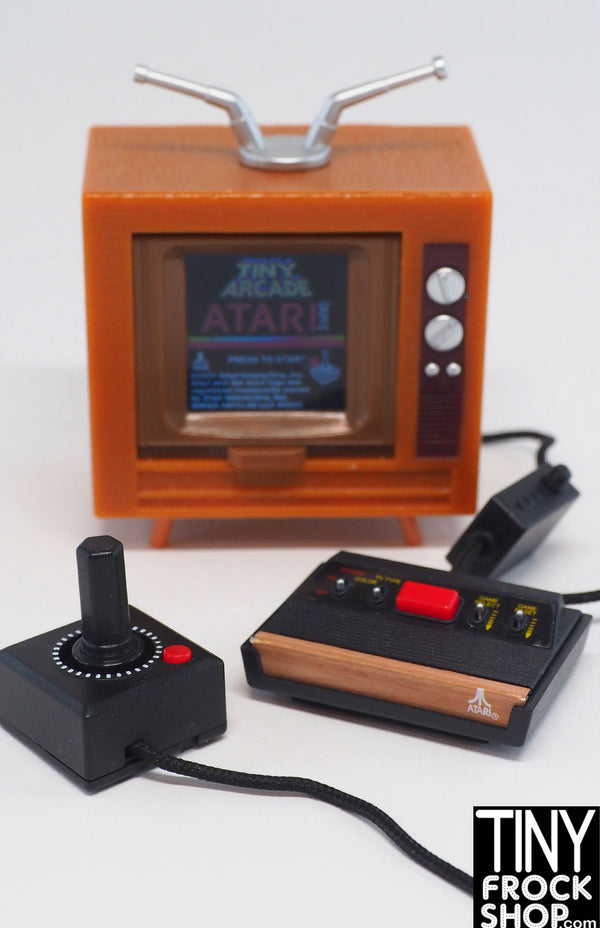 https://cdn.shopify.com/s/files/1/0236/9467/products/Super-Impulse-Worlds-Smallest-Atari-2600i_600x.jpg?v=1679414680