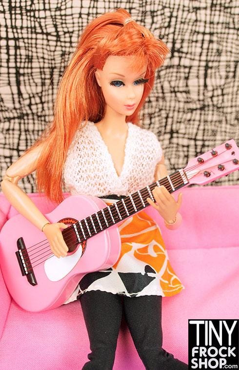 barbie playing guitar