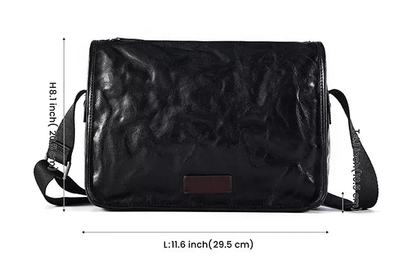 Black vegetable-tanned leather crossbody bag for a stylish look