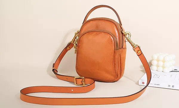 Fashionable women's sling bag with mini backpack design