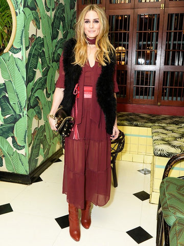 Olivia Palermo in a burgundy belted dress