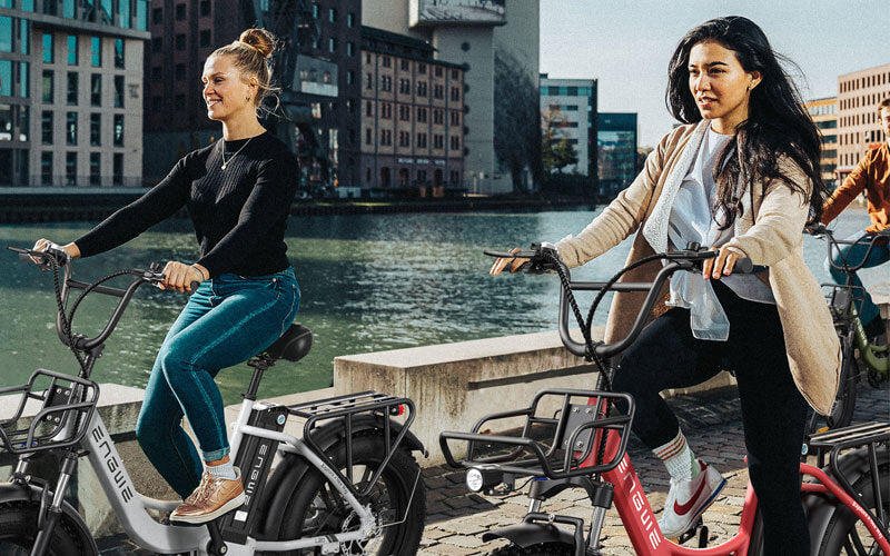 2 girls riding electric bikes for adults