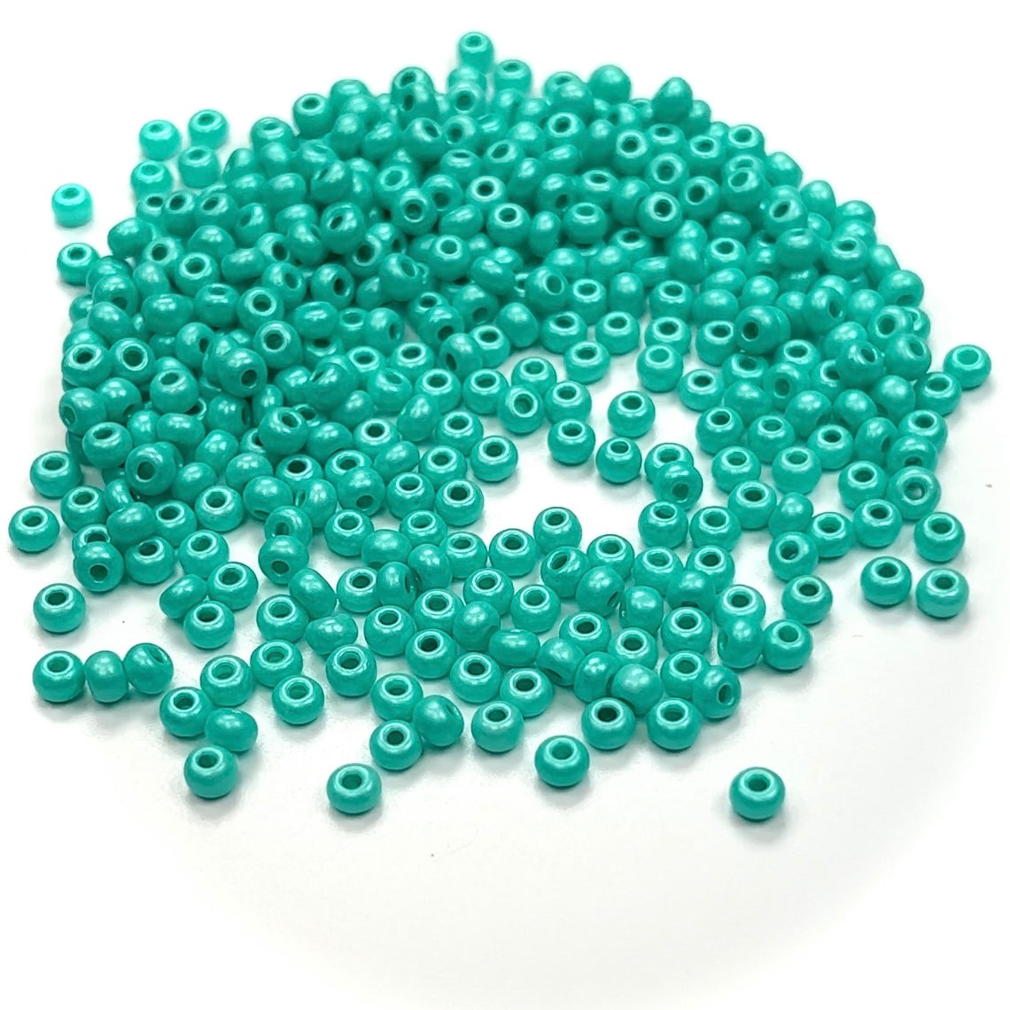 Preciosa Czech glass seed bead 15/0 Dark Green Transparent glass