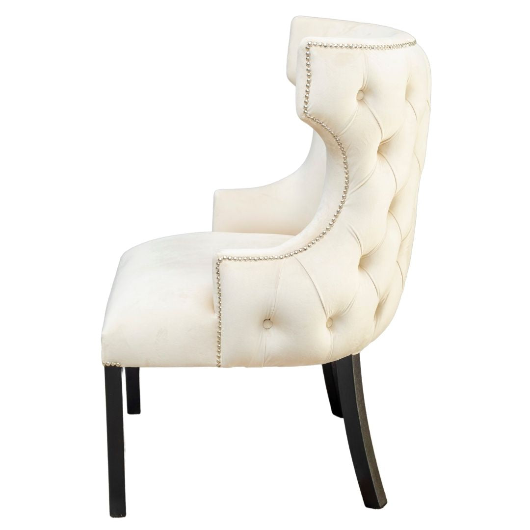 cream button back dining chairs