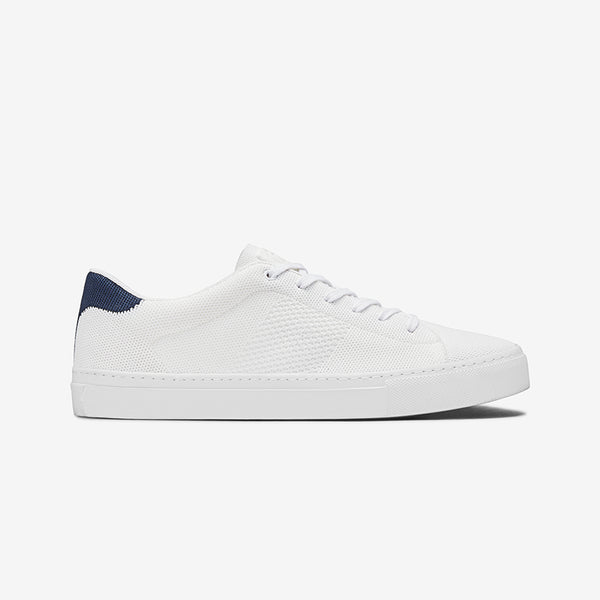 navy and white sneakers