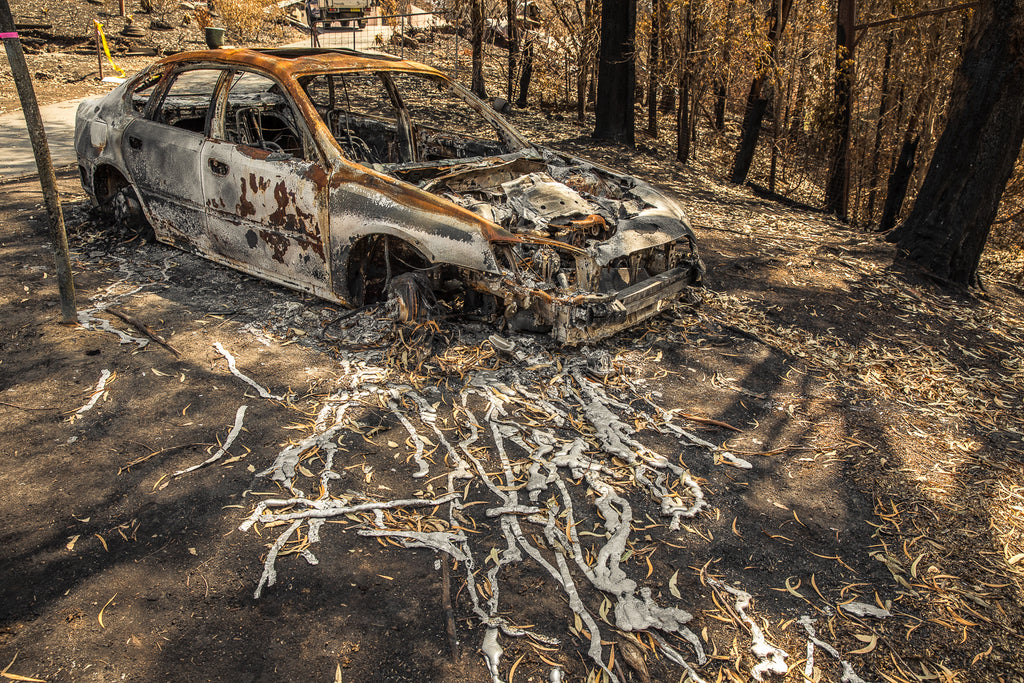 Australian bush fires on the south east coast of NSW burnt out melted car