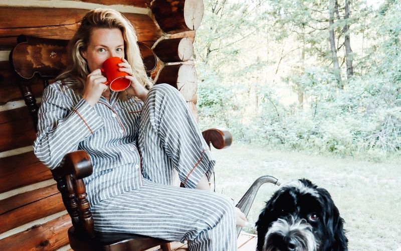 jessica sitting on chair on porch with coffee