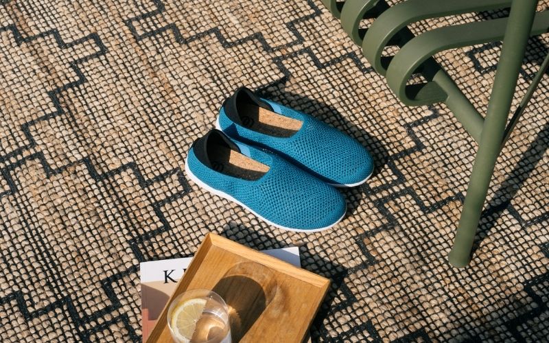 blue breathe summer slippers on outdoor mat