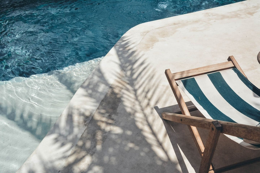 deckchair by the water for keeping holiday feeling alive