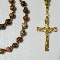 Upclose of crucifix Catholic Rosary - Leopard Jasper, Gold Tone Four Basilicas of Rome Crucifix