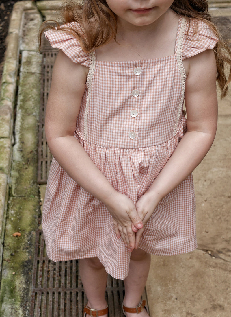 Lali Pinafore Dress in Peach Chex