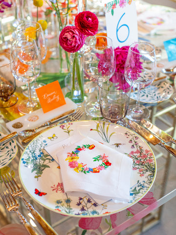 Table scape of florals, inspired by the custom water color from invitation suite. 