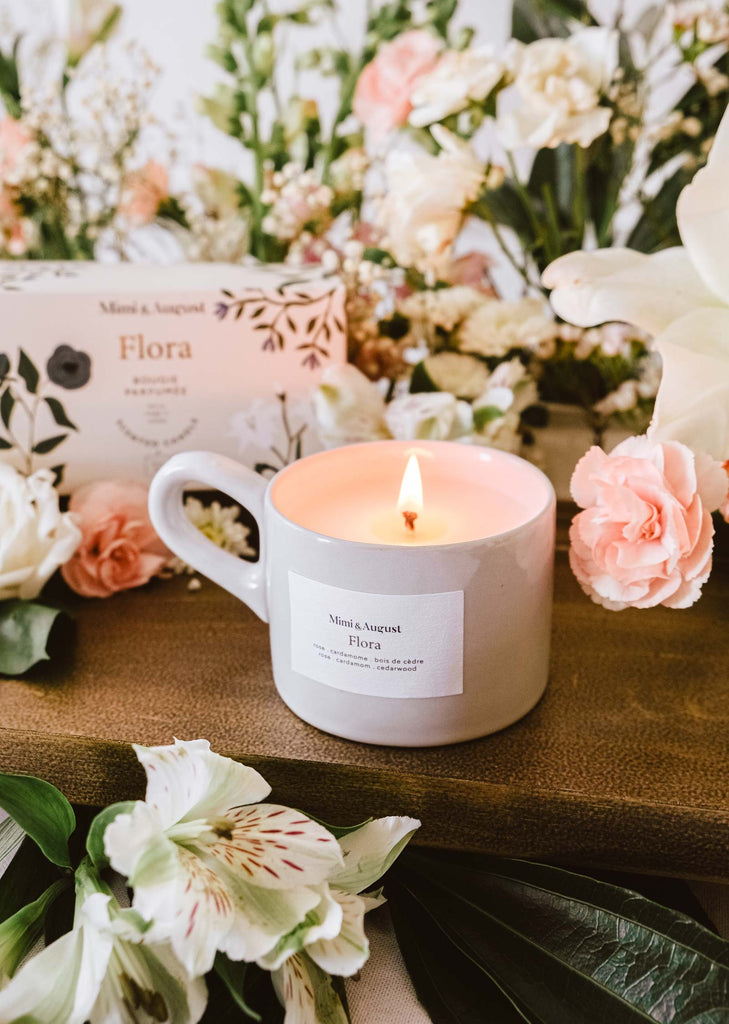 https://cdn.shopify.com/s/files/1/0240/0523/products/Flora-candle-5oz-mimi-and-august-2_1024x1024.jpg?v=1679659948