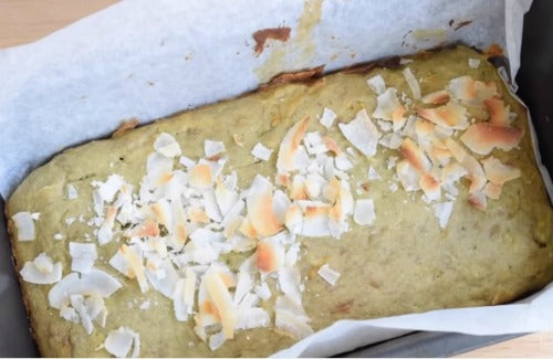 Vegan, egg-free, dairy-free green tea matcha banana bread with coconut flakes