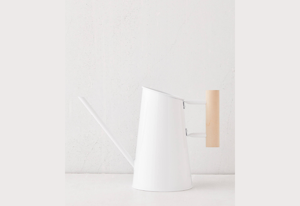 White and wood watering can