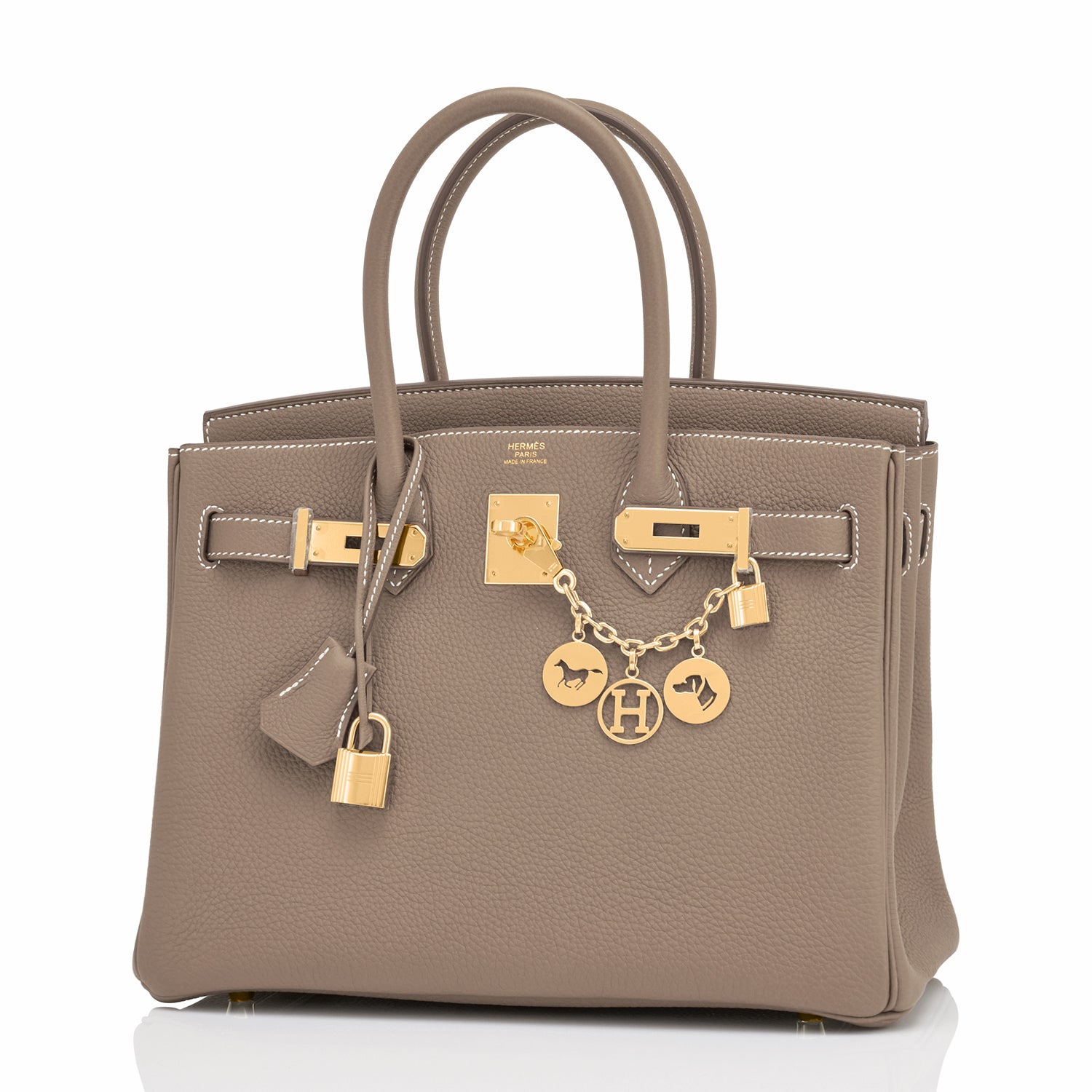One of the most-coveted combination: Etoupe and Gold Hardware. In