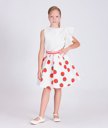 ecru ruffled sleeve blouse and ecru skirt with tomato prints