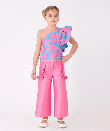 blue one shoulder pink floral blouse and pink pants