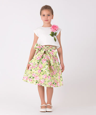 ecru blouse with a 3D pink rose and green floral skirt