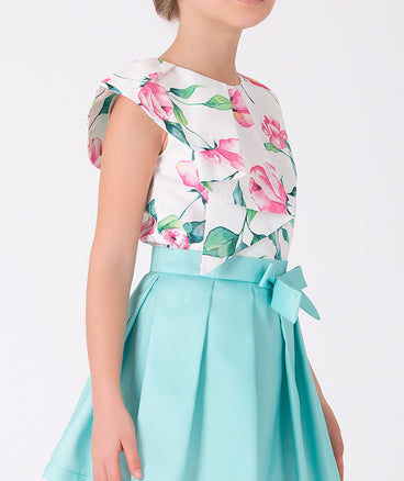 ecru floral ruffled blouse and blue skirt