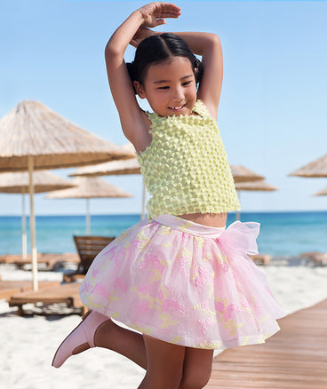 green fluffy blouse and pink pastel skirt