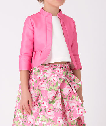 pink jacket and floral skirt with a bow