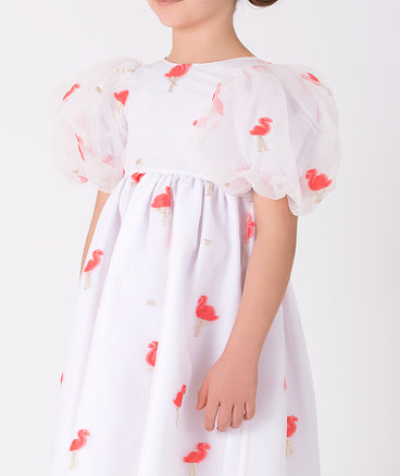 white balloon sleeved dress with pink flamingos