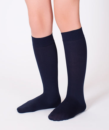 Navy classic midi socks for girls, made from a soft cotton blend with elastane added to give them stretch. 