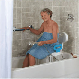 An elderly woman grabbing onto a grab bar in a bathtub