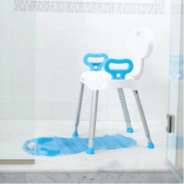 A white shower seat in a shower