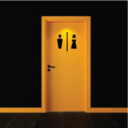A yellow bathroom door with a male and female symbol on it