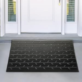 An entryway ramp placed in front of a home's front door