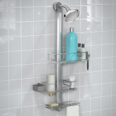 A shower caddy hanging from a shower