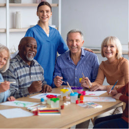 A group of elderly people at a table