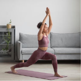 A woman doing yoga for a hip flexor strain