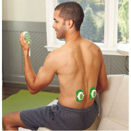 A man using a TENS unit on his lower back