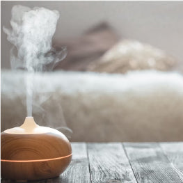 A humidifier on a wood table
