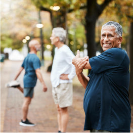 A group of elderly men stretching