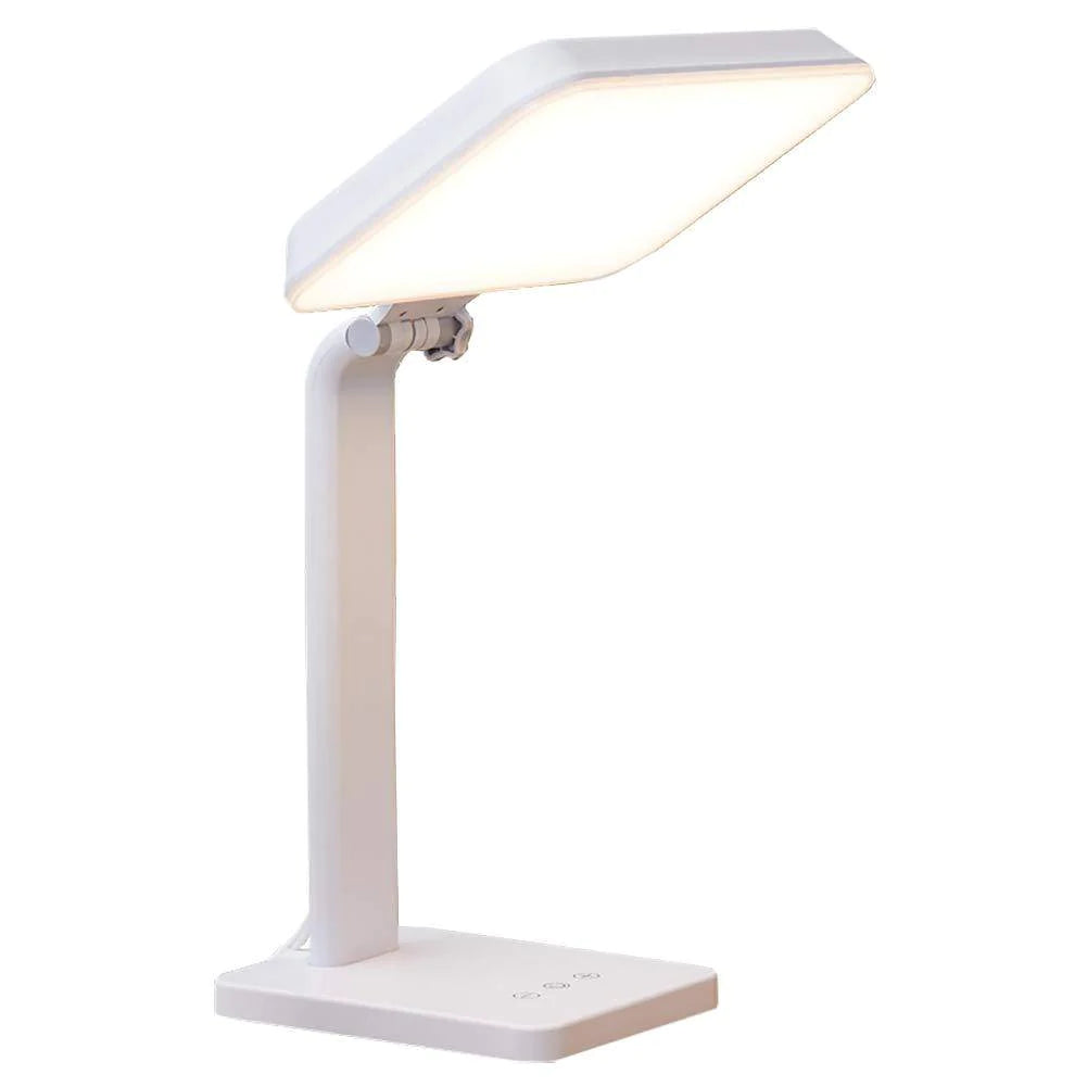 A white therapy lamp with a square head