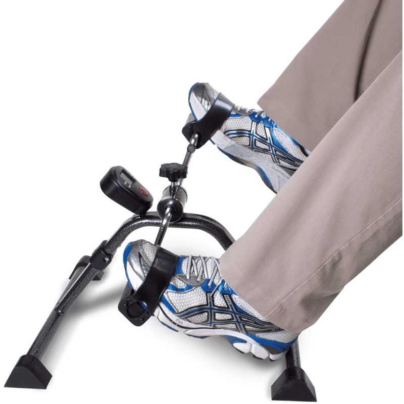 Carex Pedal exerciser on a white background with feet pedalling