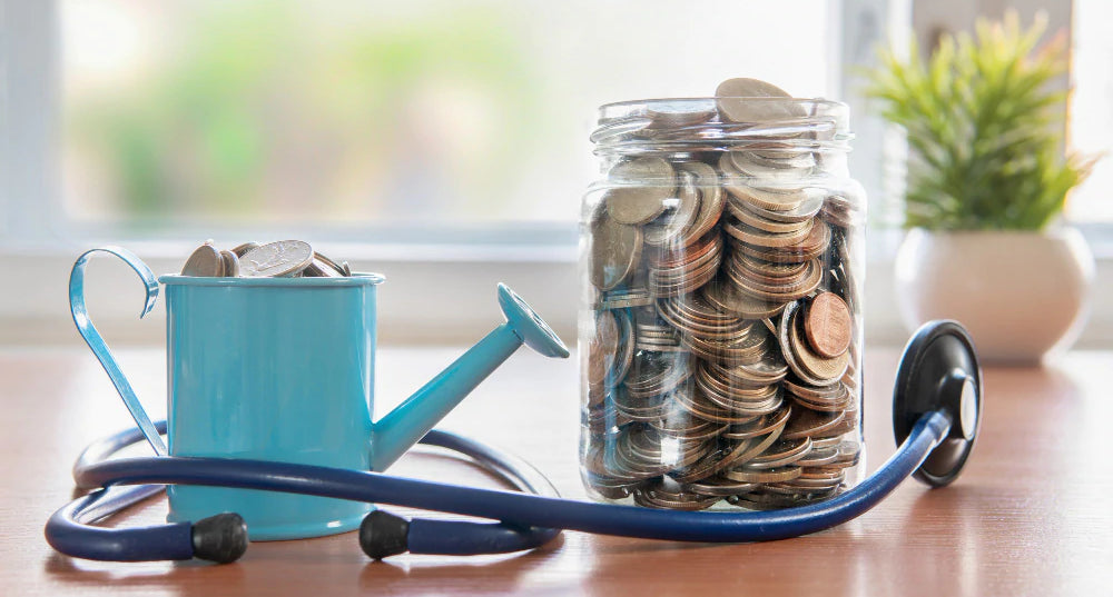  A watering can filled with coins next to a coin jar and stethoscope