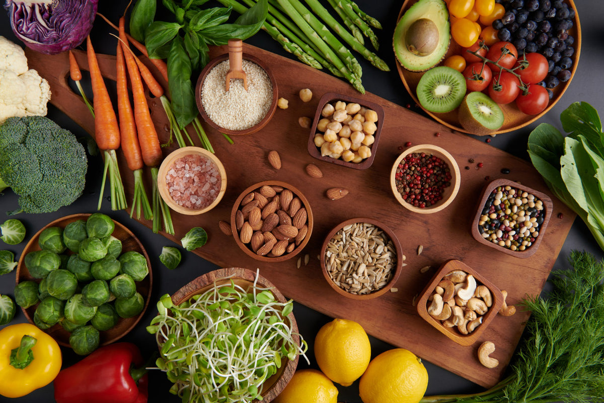 Various healthy foods on a wood surface