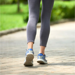 A close up of a woman walking