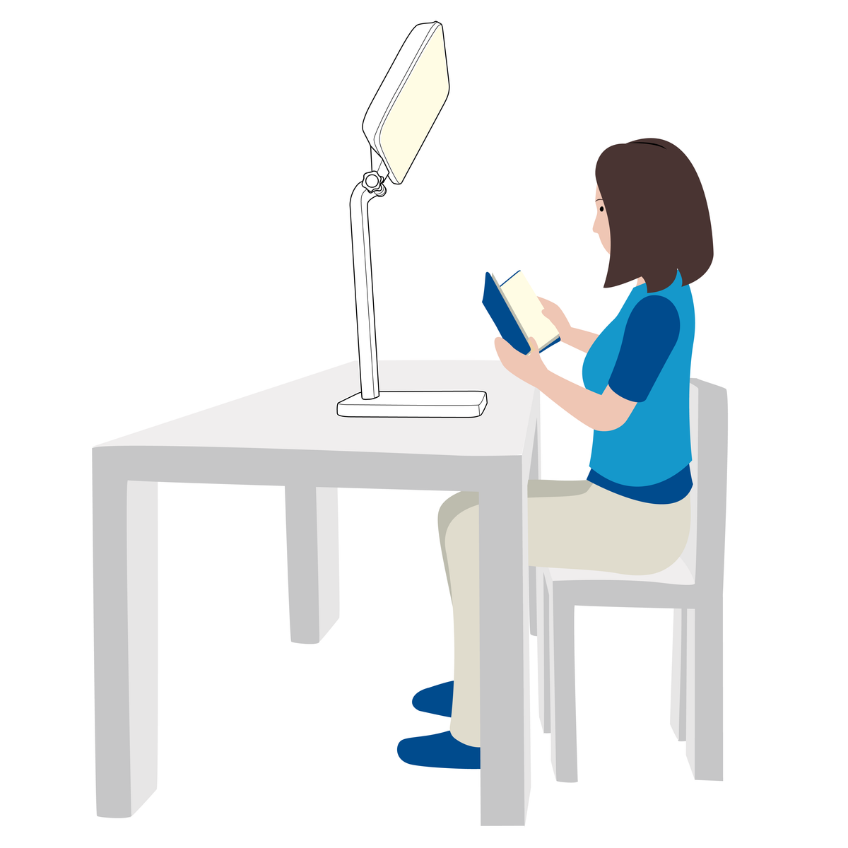 A graphic of a woman using a therapy lamp that’s at the proper distance