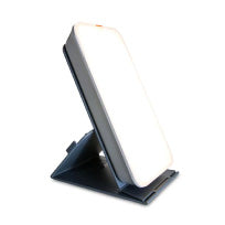 A compact therapy lamp with a gray base